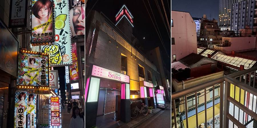 Several buildings with signs